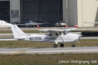 N21458 @ KSRQ - Cessna Skyhawk (N21458) taxis at Sarasota-Bradenton International Airport - by Donten Photography