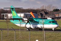 EI-FAX @ EGHH - Taxies in through the wood...only named Finnian on starboard nose. - by John Coates