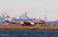 N328AA @ KJFK - Just before take off from RWY 4L - by Gintaras B.