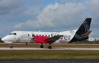 N343AG @ KEYW - SAAB 340B - by Mark Pasqualino