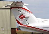 OO-LAC @ EGHH - Detail of tail logo of Skylife Guard Air Ambulance - by John Coates