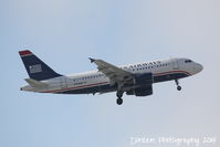 N748UW @ KSRQ - US Air Flight 2015 (N748UW) arrives at Sarasota-Bradenton International Airport following a flight from Charlotte-Douglas International Airport - by Donten Photography