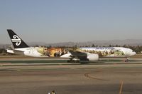 ZK-OKP @ LAX - New 777 paint scheme as part of Hobbit series - by ian mcdonell