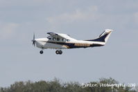 N665SW @ KSRQ - Cessna Centurion (N665SW) departs Sarasota-Bradenton International Airport - by Donten Photography