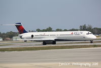 N933DL @ KSRQ - Delta Flight 2298 (N933DL) taxis at Sarasota-Bradenton International Airport - by Donten Photography