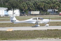 N166JP @ KSRQ - Diamond Star (N166JP) taxis at Sarasota-Bradenton International Airport - by Donten Photography