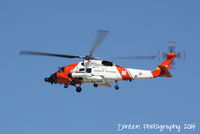 6014 @ KSRQ - HH-60 Jayhawk (6014) from US Coast Guard Air Station Clearwater flies into Sarasota-Bradenton International Airport - by Donten Photography