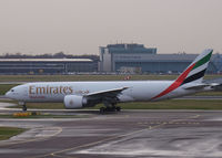 A6-EFG @ AMS - Taxi to runway 18L of Schiphol Airport - by Willem Göebel