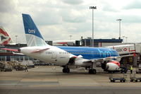 G-DBCD @ EGLL - BMI A319 at the gate at  London Heathrow airport. - by Henk van Capelle