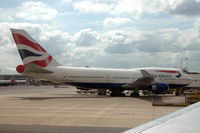 G-BNLU @ EGLL - British Airways 747-400 at the gate London Heathrow airport. - by Henk van Capelle