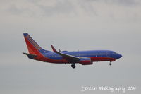 N745SW @ KMCO - Southwest Flight 2145 (N745SW) arrives at Orlando International Airport following a flight from Bishop International Airport - by Donten Photography