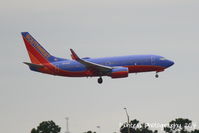 N452WN @ KMCO - Southwest Flight 1265 (N452WN) arrives at Orlando International Airport following a flight from Chicago-Midway International Airport - by Donten Photography