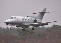 G-IFTE @ EGHH - On approach to 26 in the rain - by John Coates