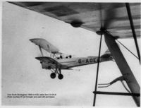 G-AOEL @ BHX - One of Midland Aero Club's Tiger Moths G-AOEL flying over South Birmingham in 1958. Picture taken from G-ANLB. Photo is the property of a friend, Lyel Swingler and is used with his permission.