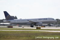 N432UA @ KSRQ - United Flight 623 (N432UA) departs Sarasota-Bradenton International Airport enroute to Chicago-O'Hare International Airport - by Donten Photography