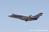 N377JC @ KSRQ - Raytheon Hawker 800 (N377JC) departs Sarasota-Bradenton International Airport - by Donten Photography