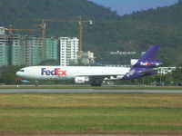 N614FE @ WMKP - FedEx MD11 - by afifidris23