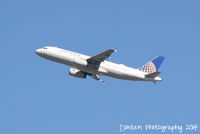 N460UA @ KMCO - United Flight 759 (N460UA) departs Orlando International Airport enroute to Chicago-O'Hare International Airport - by Donten Photography