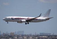 9Y-SXM @ MIA - Caribbean 737-800 - by Florida Metal
