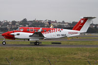 VH-NAO @ YSSY - off on another mission - by Bill Mallinson