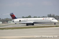 N947DL @ KSRQ - Delta Flight 2298 (N947DL) taxis at Sarasota-Bradenton International Airport - by Donten Photography