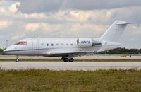 N34FS @ KFLL - CL605 taxying to the runway - by FerryPNL