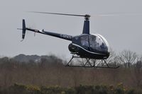 G-MDKD @ EGFH - Resident Robinson R-22 operated by HeliAir Wales. - by Roger Winser