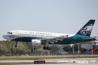 N709UW @ KSRQ - US Air Flight 1801 (N709UW) Philadelphia Eagles arrives at Sarasota-Bradenton International Airport - by Donten Photography