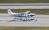 N366TA @ KFLL - Cessna 208 - by Mark Pasqualino