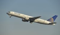 N504UA @ KLAX - Departing LAX on 25R - by Todd Royer