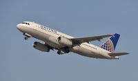 N413UA @ KLAX - Departing LAX on 25R - by Todd Royer