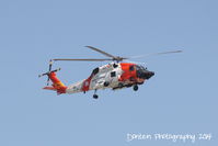 6021 @ KSRQ - A US Coast Guard HH-60 Jayhawk (6021) from Air Station Clearwater does a touch and go at Sarasota-Bradenton International Airport - by Donten Photography