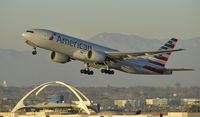 N770AN @ KLAX - Departing LAX on 25R - by Todd Royer