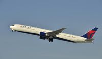 N827MH @ KLAX - Departing LAX on 25R - by Todd Royer