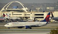 N811DZ @ KLAX - Taxiing to gate at LAX - by Todd Royer