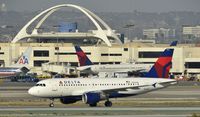 N302NB @ KLAX - Taxiing to gate at LAX - by Todd Royer