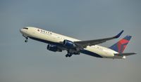 N156DL @ KLAX - Departing LAX on 25R - by Todd Royer