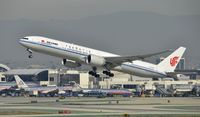 B-2039 @ KLAX - Departing LAX on 25R - by Todd Royer
