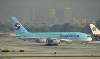 HL7622 @ KLAX - Taxiing to parking LAX - by Todd Royer