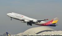HL7428 @ KLAX - Departing LAX on 25R - by Todd Royer