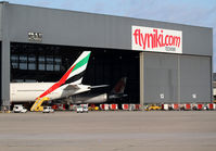 A6-ECS @ LOWW - Emirates B777 parked inside the Niki Hangar - by Thomas Ranner