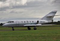 UR-CLD @ EGHH - Taxiing to Cobham - by John Coates