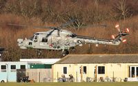 XZ722 @ EGHH - Arriving at Cobham past the Flying Club Cafe - by John Coates