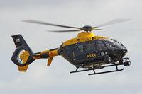 G-WONN @ EGFH - South and East Wales Police Air Support helicopter, Police 32, seen lifting at EGFH. - by Derek Flewin