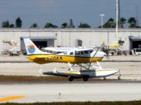 N305KW @ KMIA - Key West Seaplanes Cessna U206G Stationair taking off at MIA. - by Kreg Anderson