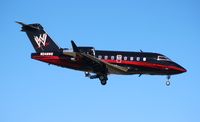 N248WE @ ORL - WWE Wrestling Challenger 604, used to wear tail number N247WE - which now is on a Global 5000 owned by Vince McMahon's WWE - by Florida Metal