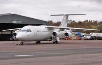 G-POWF @ EGHH - About to enter paintshop for respray to North Cariboo Air livery - by John Coates