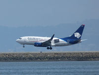 XA-AGM @ SFO - Landing at San Francisco. - by Bill Larkins