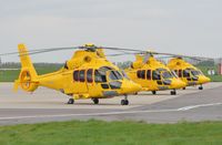 OO-NHJ @ EGSH - Line up of NHV Eurocopter EC-155's at Norwich. - by Graham Reeve