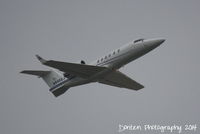N945EJ @ KSRQ - Learjet 40 (N945EJ) departs Sarasota-Bradenton International Airport enroute to Laurence G Hanscom Field - by Donten Photography